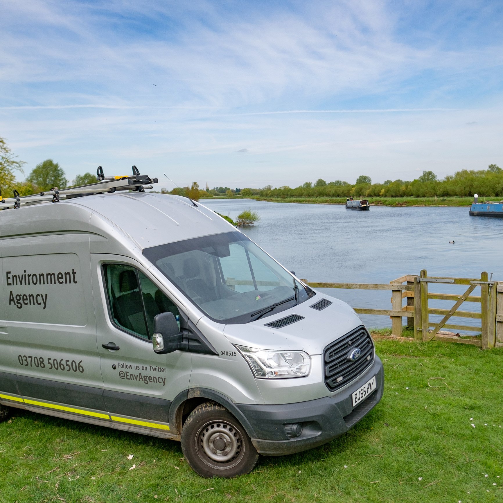 Environmental agency van parked outside lake