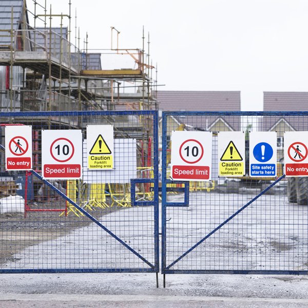 Entrance to building site with signage