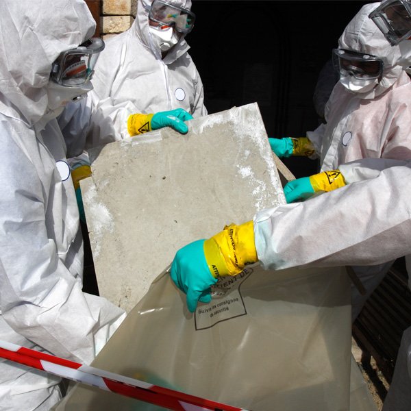 Team of 3 removing waste from site