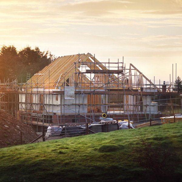 House building site during sun set