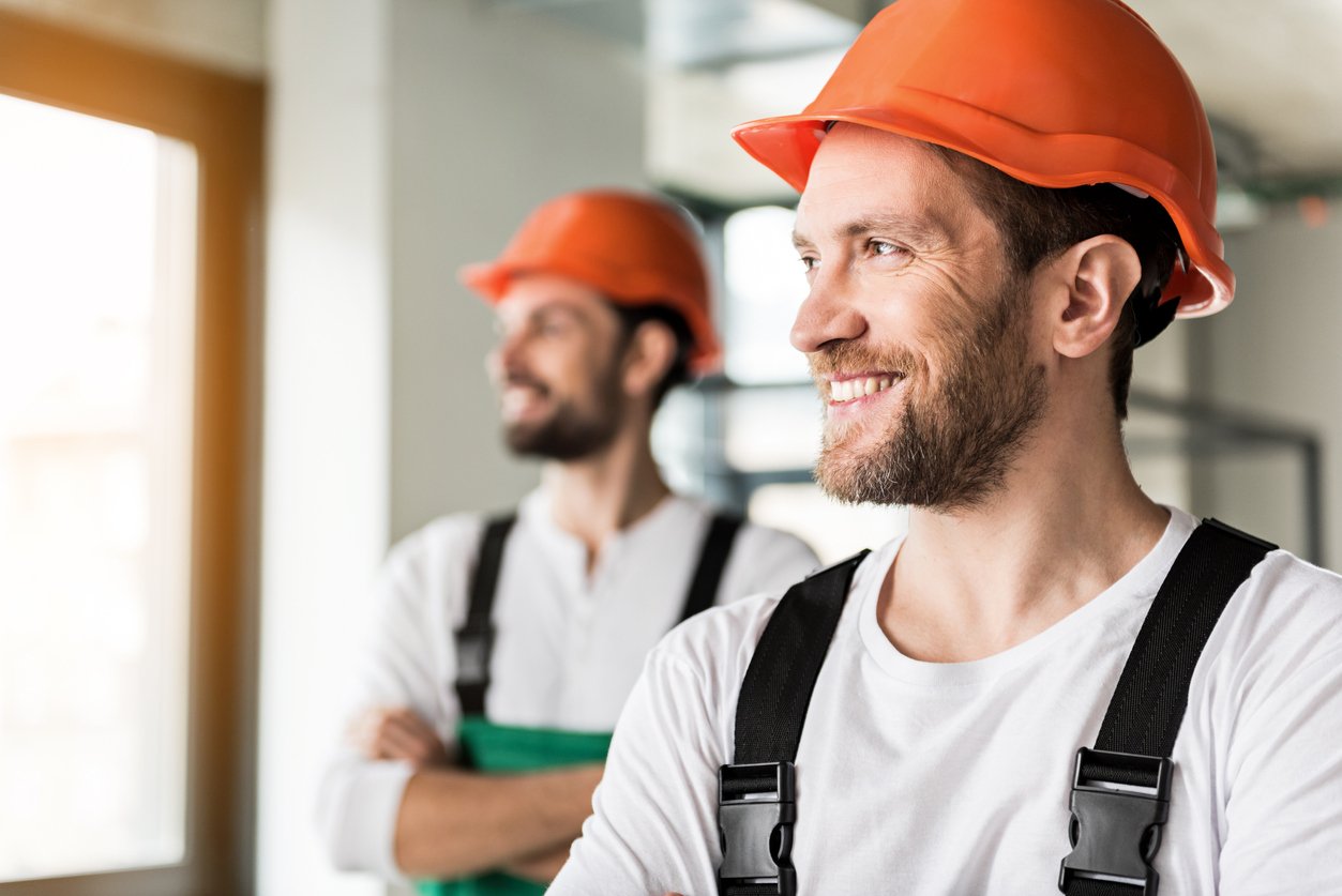 Smiling builder in hardhat