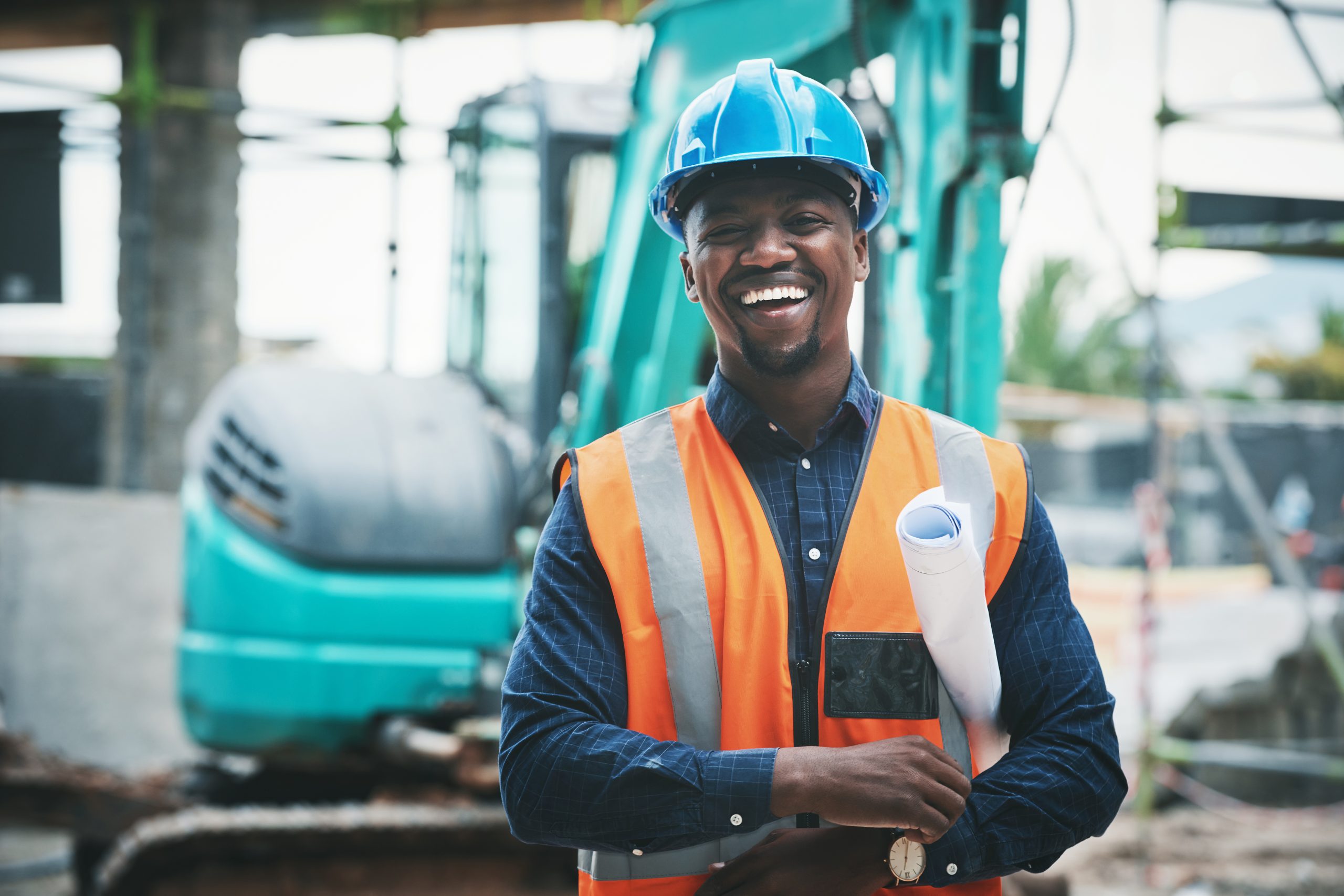 Portrait of a young man working at a construction site